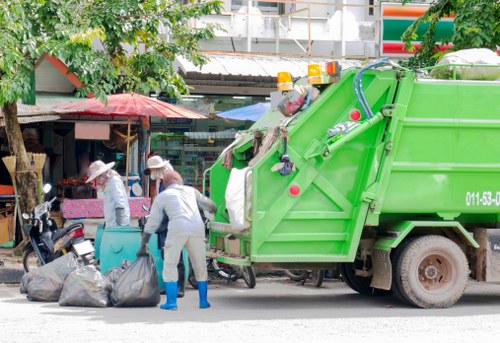 Local gardeners performing garden clearance